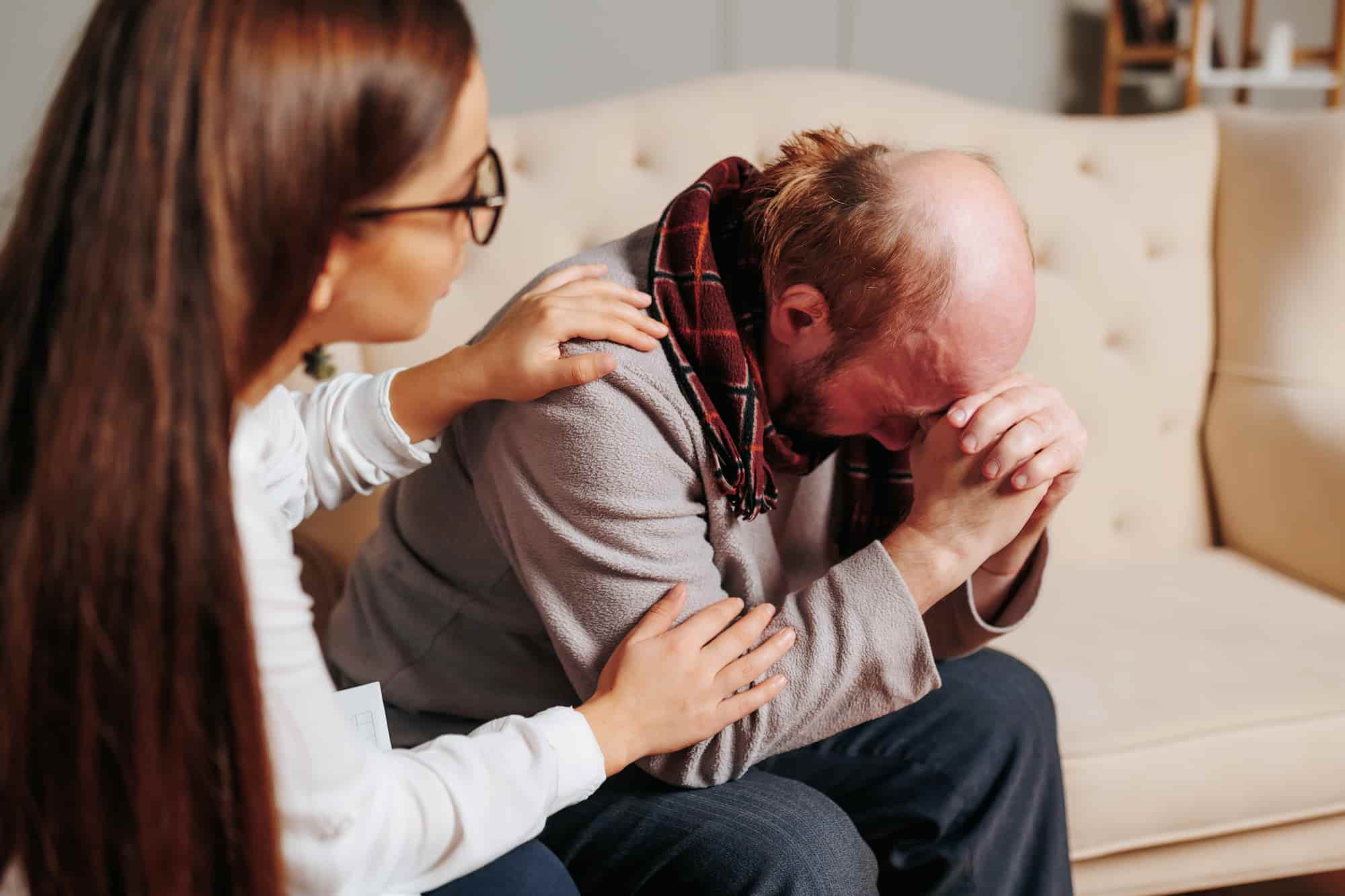 a family member speaking to a man about going to rehab
